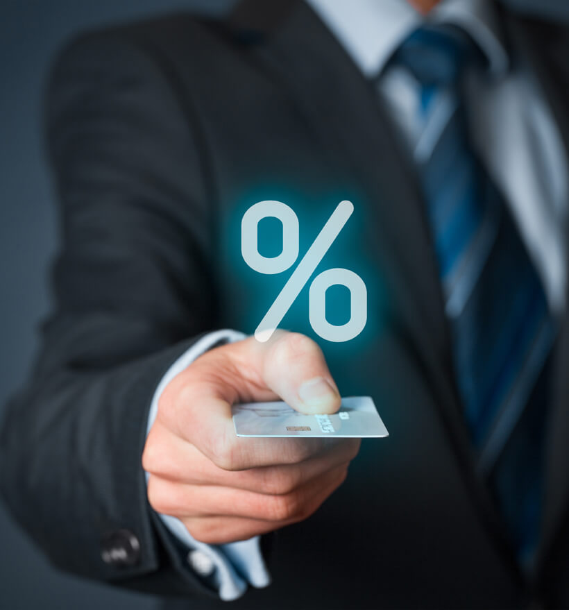 Virtual percentage sign floating above a card